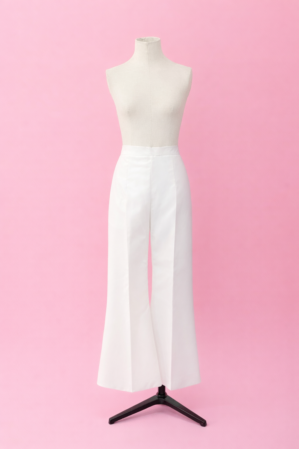 Sample of white flared trousers, size 4